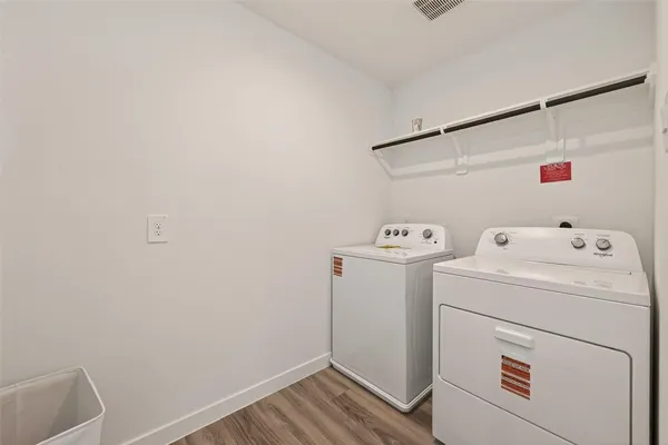 a utility room with dryer and washer