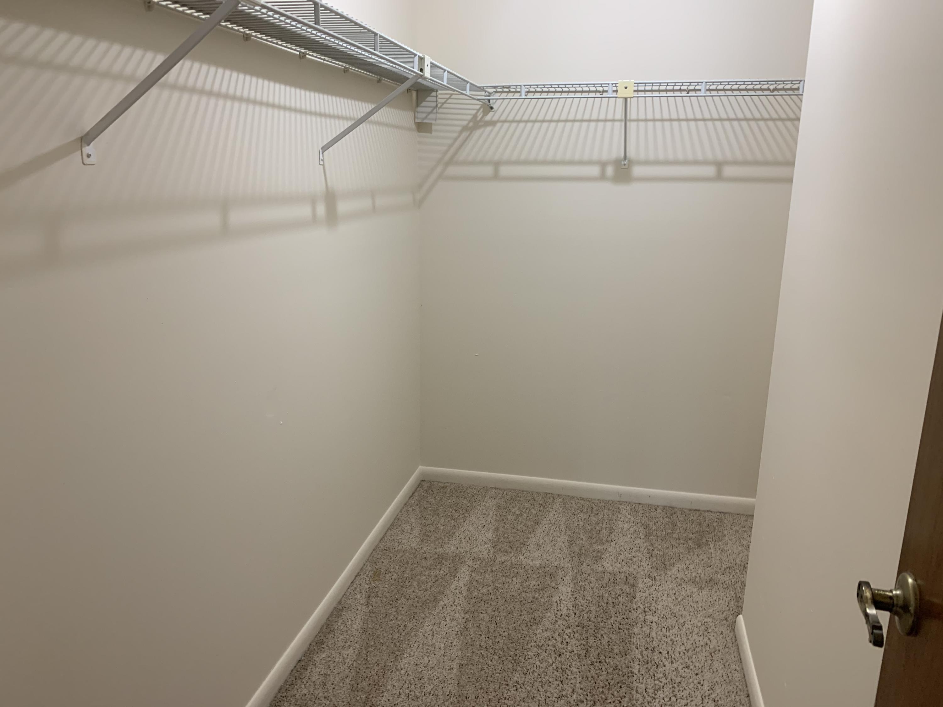 8259 Southeast Croft Circle, Unit 7 Hobe Sound, FL 33455 - Photo 12 of 24 Master closet