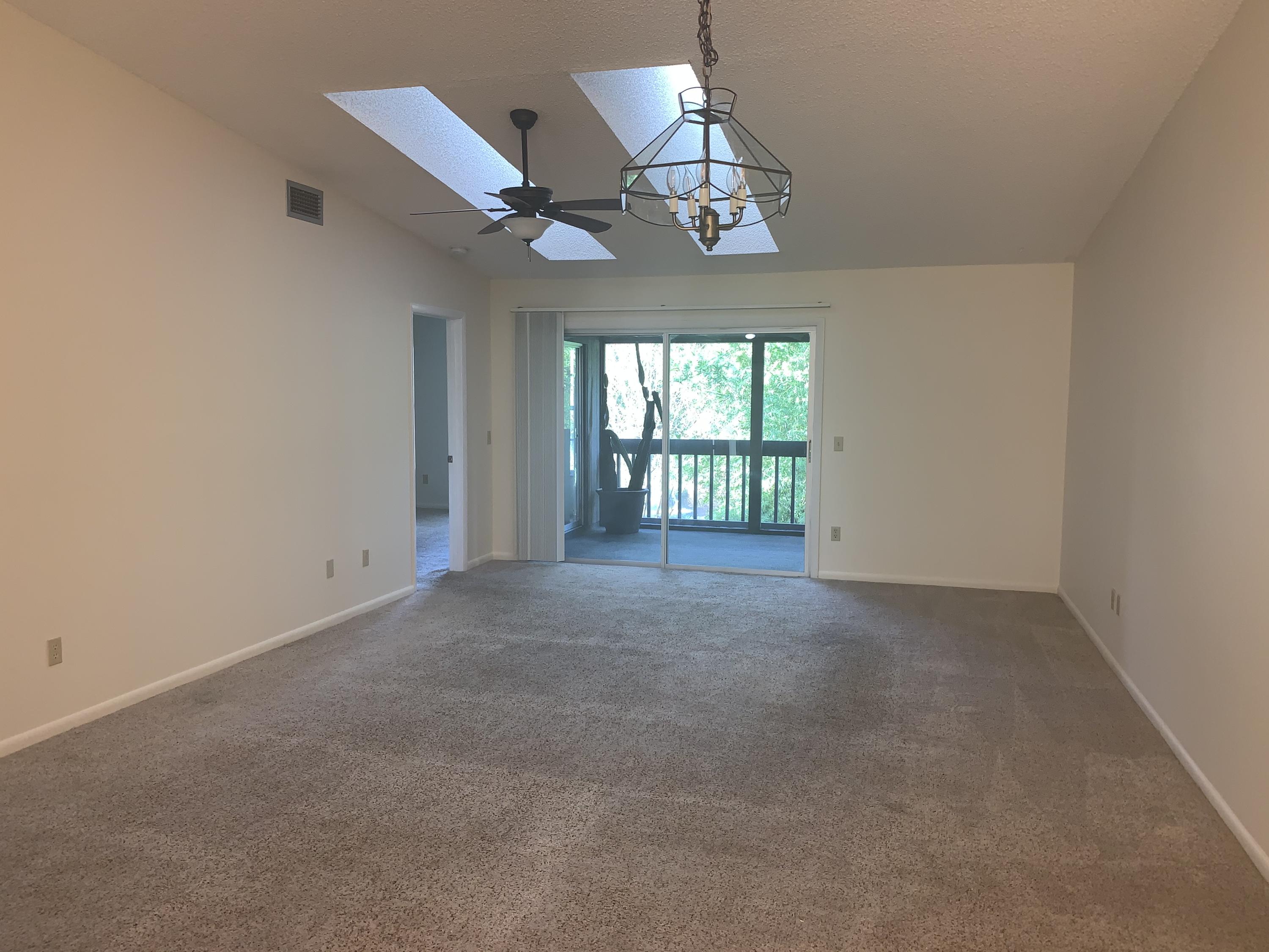 8259 Southeast Croft Circle, Unit 7 Hobe Sound, FL 33455 - Photo 3 of 24 Living rm