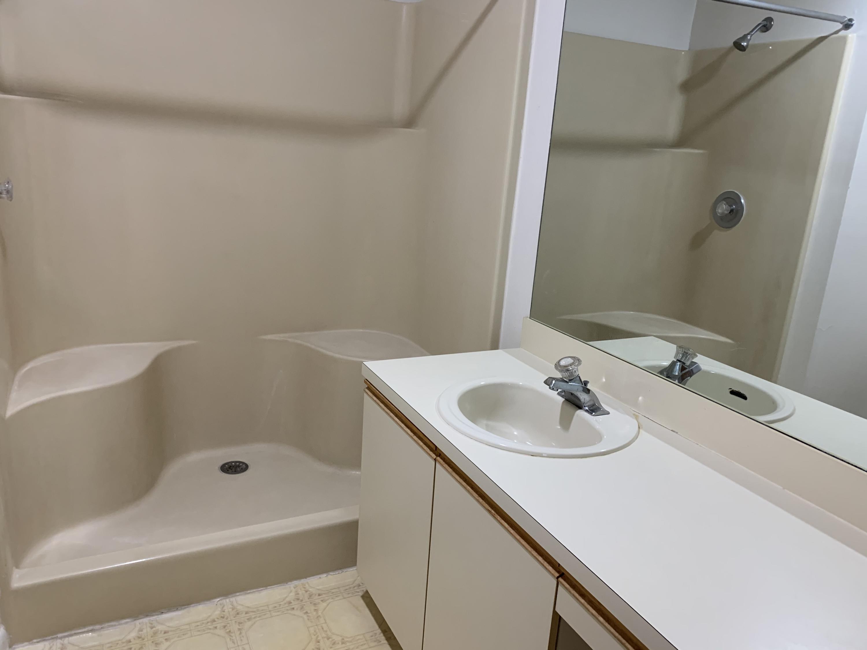 8259 Southeast Croft Circle, Unit 7 Hobe Sound, FL 33455 - Photo 9 of 24 Master bath