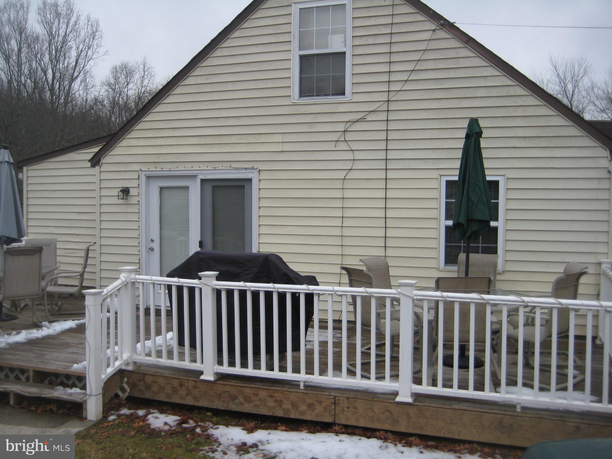 2713 Paper Mill Road Phoenix, MD 21131 - Photo 9 of 30 Huge deck with vinyl railing plenty of table space