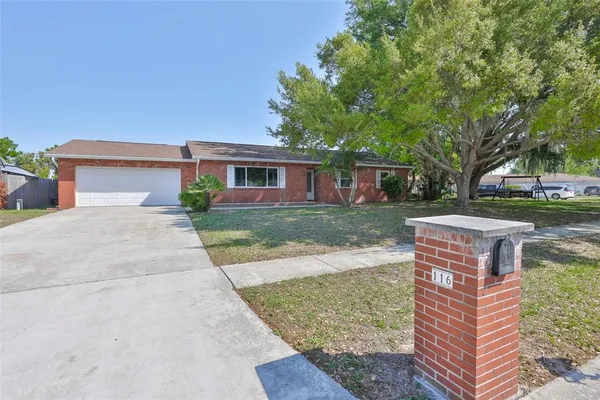 front view of house with a yard