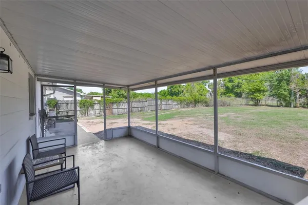 a view of a room with porch and outdoor space