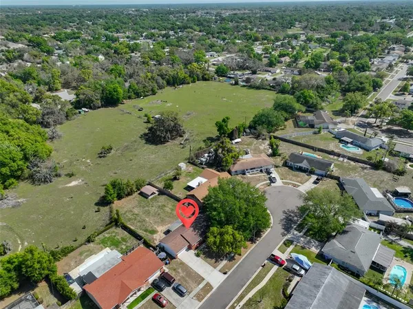 an aerial view of a city with lots of residential buildings