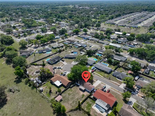 an aerial view of a city with lots of residential buildings