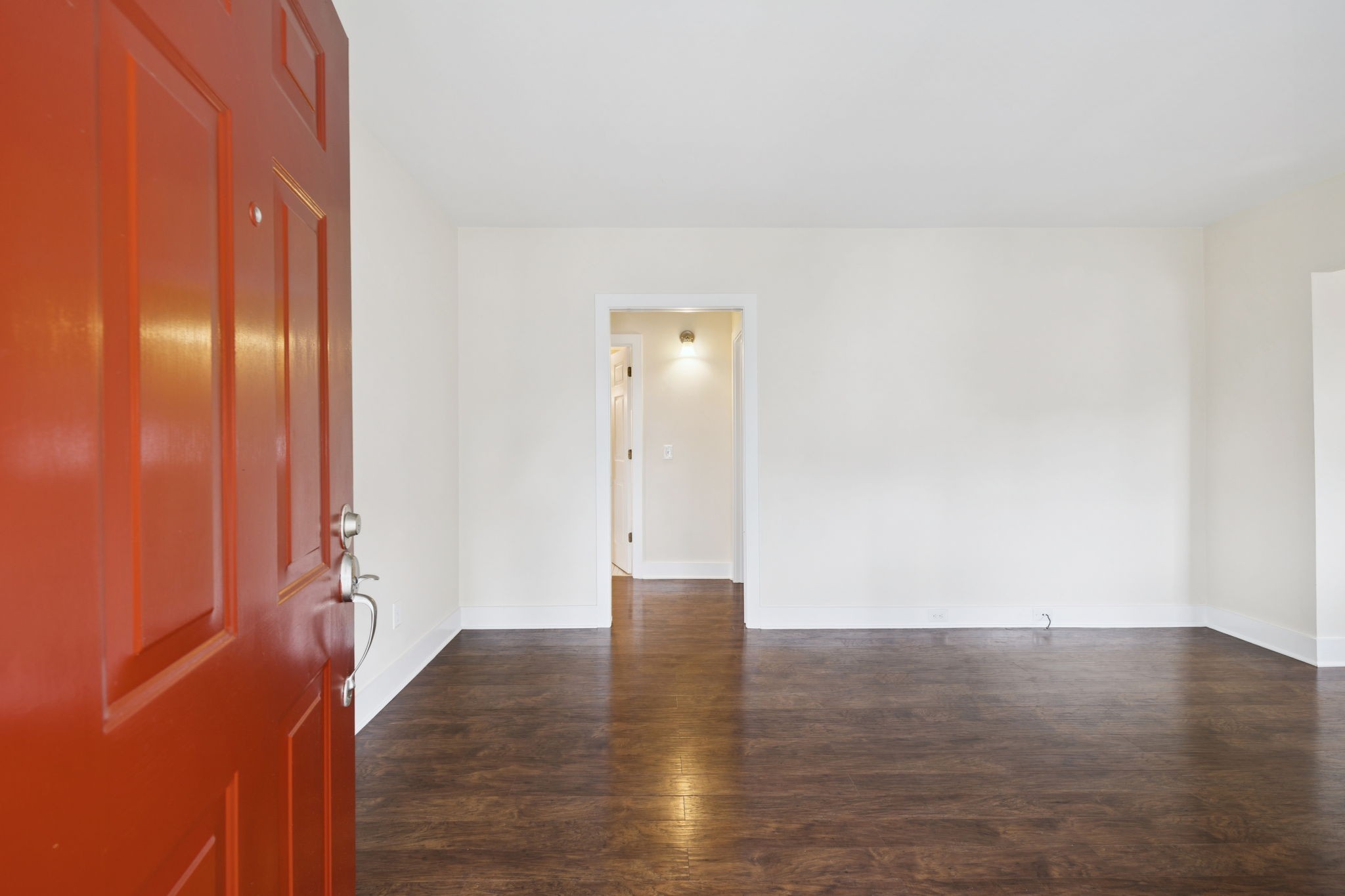 405 Lawrence Street Old Hickory, TN 37138 - Photo 12 of 52 a view of an empty room with wooden floor and a window