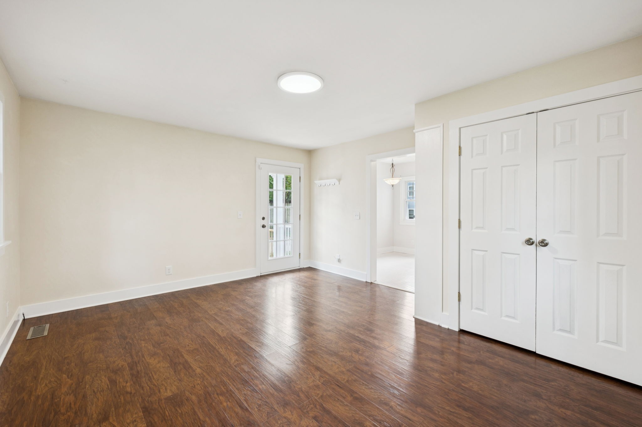 405 Lawrence Street Old Hickory, TN 37138 - Photo 27 of 52 a view of an empty room with wooden floor