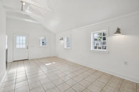 a bathroom with a toilet a sink and shower