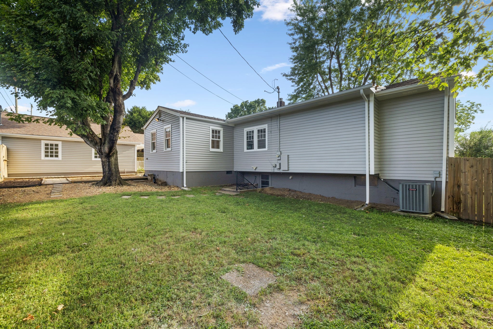 405 Lawrence Street Old Hickory, TN 37138 - Photo 47 of 52 a backyard of a house with lots of green space
