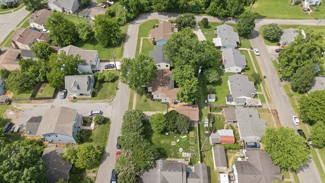 an aerial view of a city with lots of residential buildings