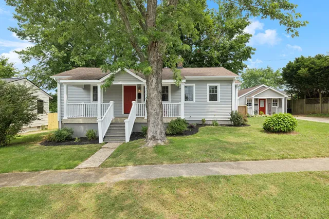 a view of a house with porch and wooden floor