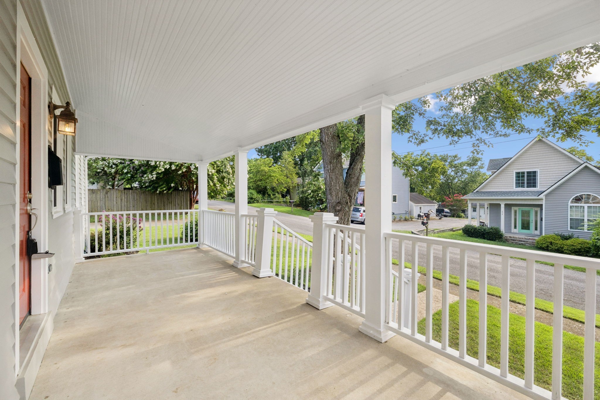 405 Lawrence Street Old Hickory, TN 37138 - Photo 8 of 52 a view of a house with a floor to ceiling window and wooden fence