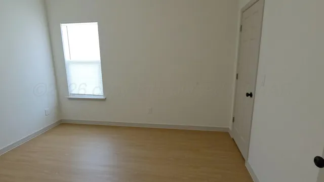 an empty room with a window