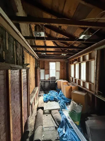 a view of a porch of a house