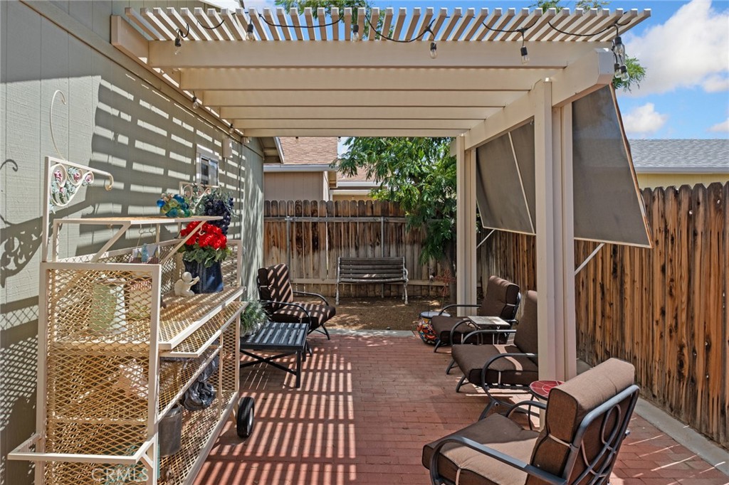 21621 Sandia Road, Unit 128 Apple Valley, CA 92308 - Photo 40 of 41 a view of entryway with wooden floor