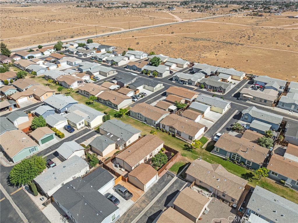 21621 Sandia Road, Unit 128 Apple Valley, CA 92308 - Photo 6 of 41 an aerial view of residential building with beach