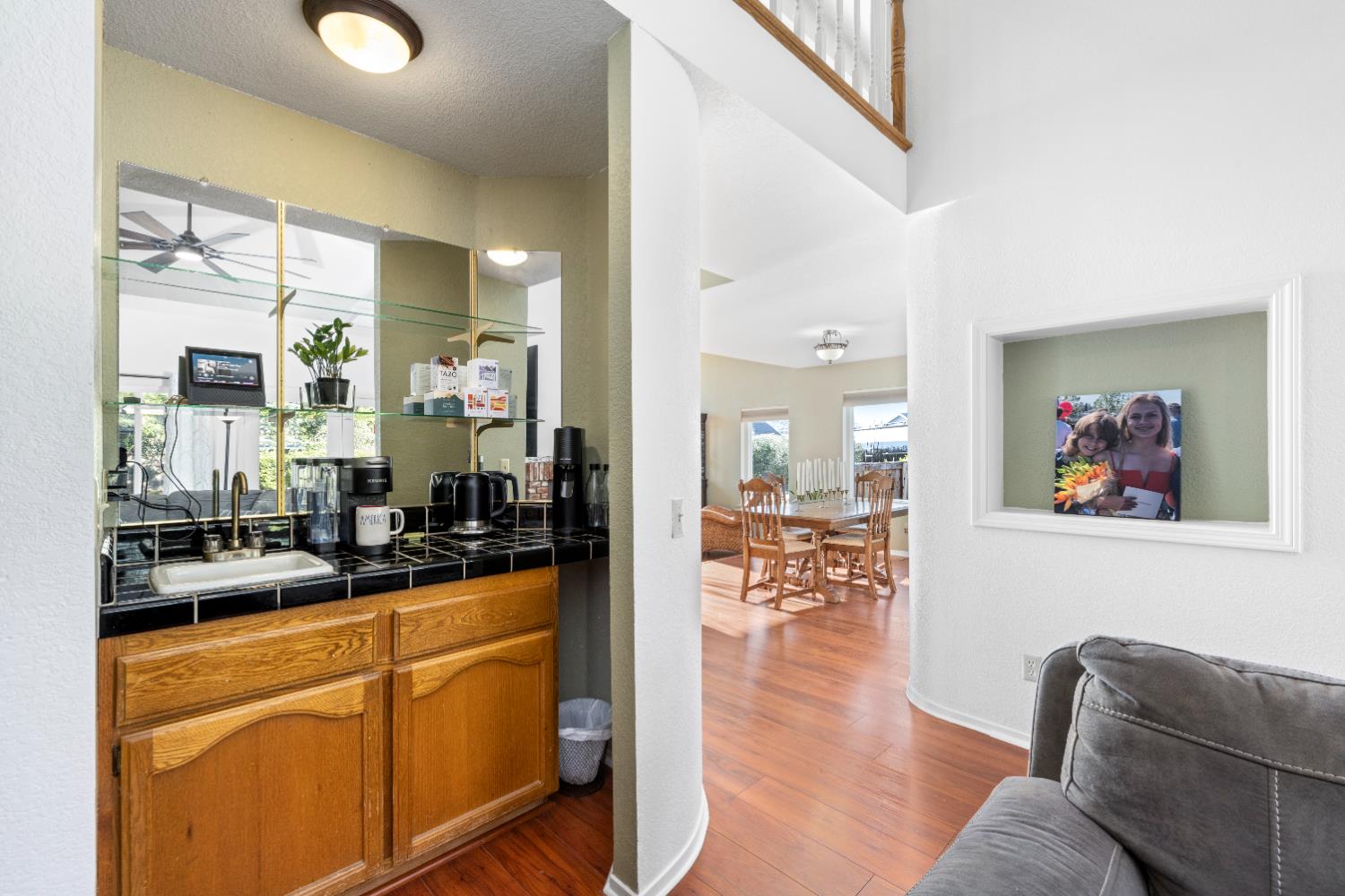 10165 Snowy Owl Way Auburn, CA 95603 - Photo 13 of 48 a living room with furniture and wooden floor