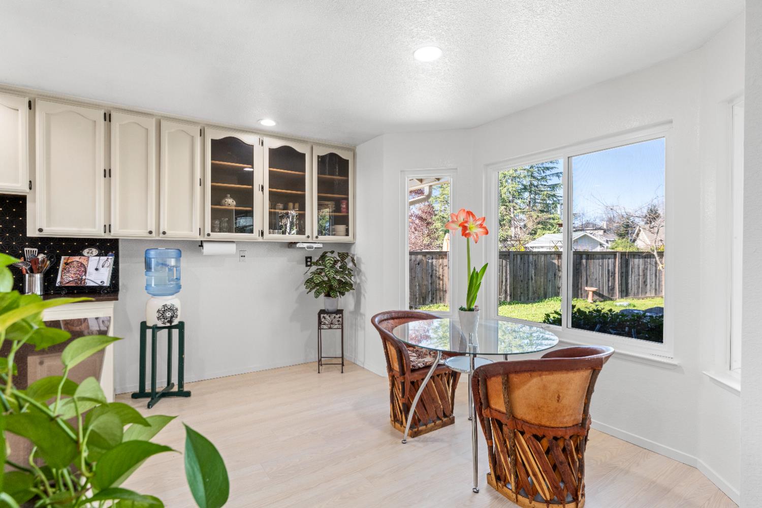 10165 Snowy Owl Way Auburn, CA 95603 - Photo 21 of 48 a dining room with furniture and a floor to ceiling window