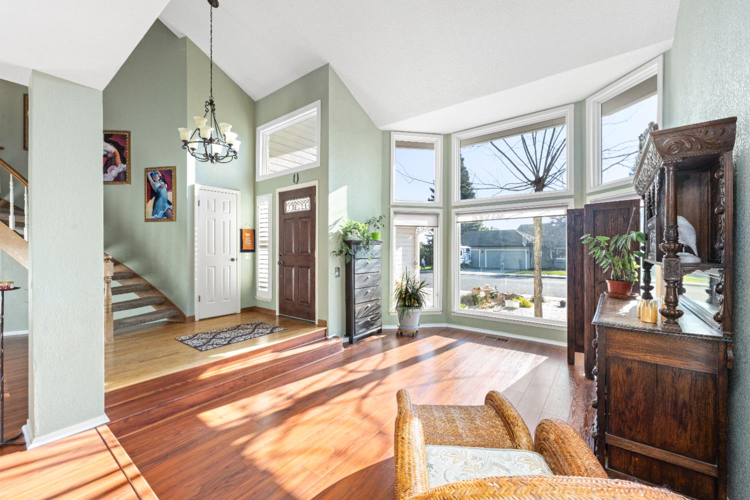 10165 Snowy Owl Way Auburn, CA 95603 - Photo 3 of 48 a bedroom with a bed and large window with outer view
