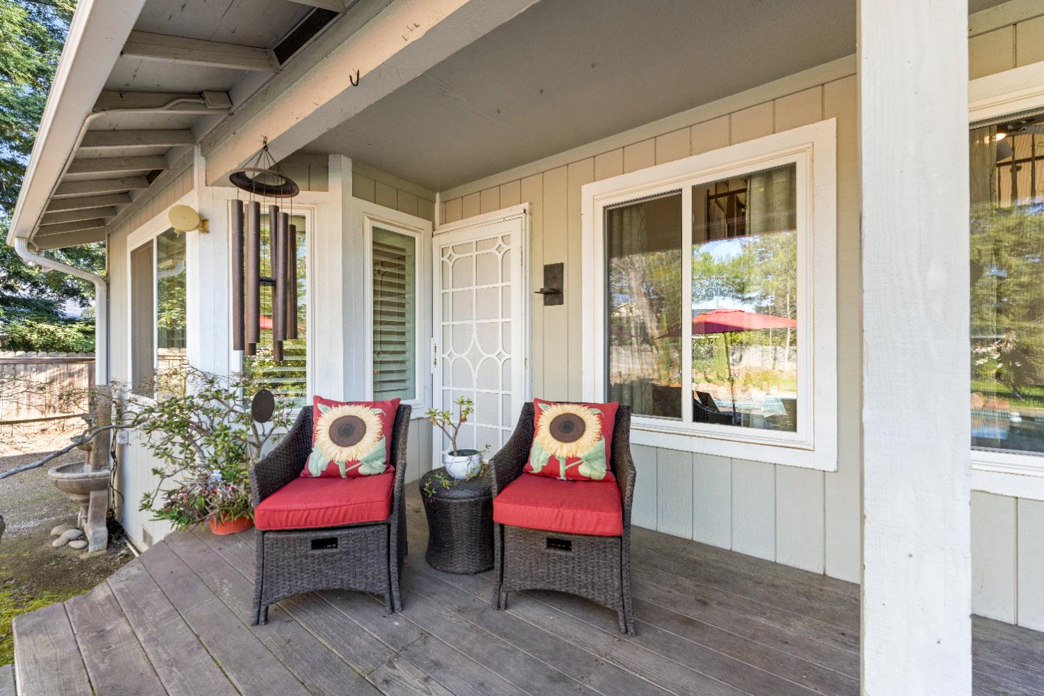 10165 Snowy Owl Way Auburn, CA 95603 - Photo 40 of 48 a outdoor space with furniture and wooden floor