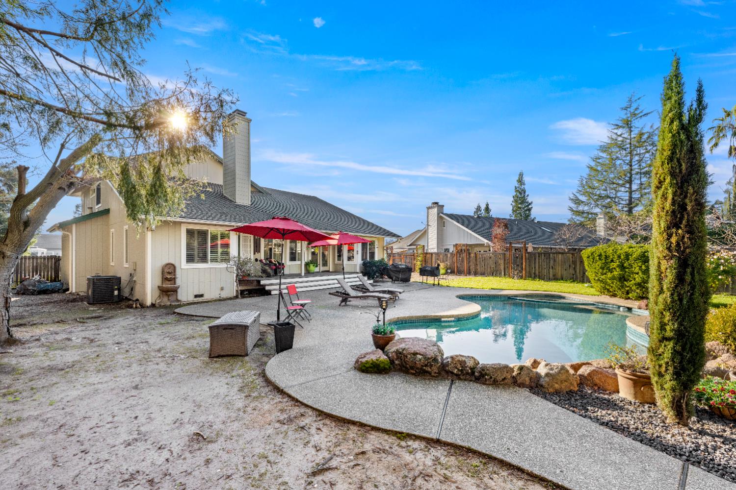 10165 Snowy Owl Way Auburn, CA 95603 - Photo 47 of 48 a view of a house with swimming pool