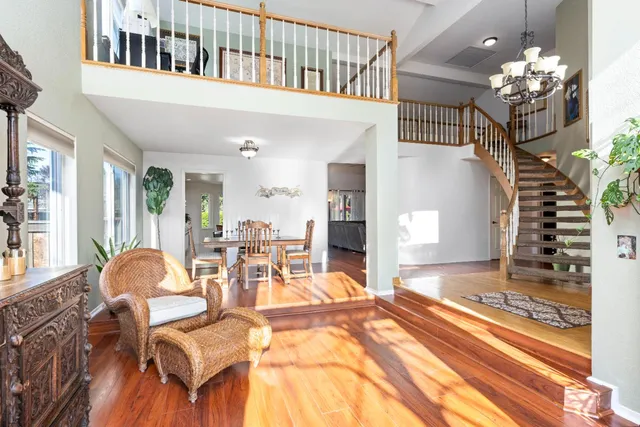 a view of a living room and dining room