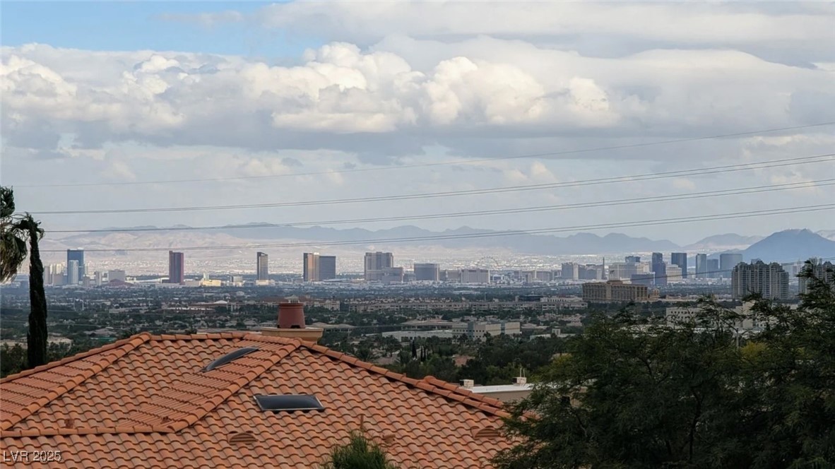 1904 Hot Oak Ridge Street Las Vegas, NV 89134 - Photo 2 of 74 View of city featuring a mountain backdrop