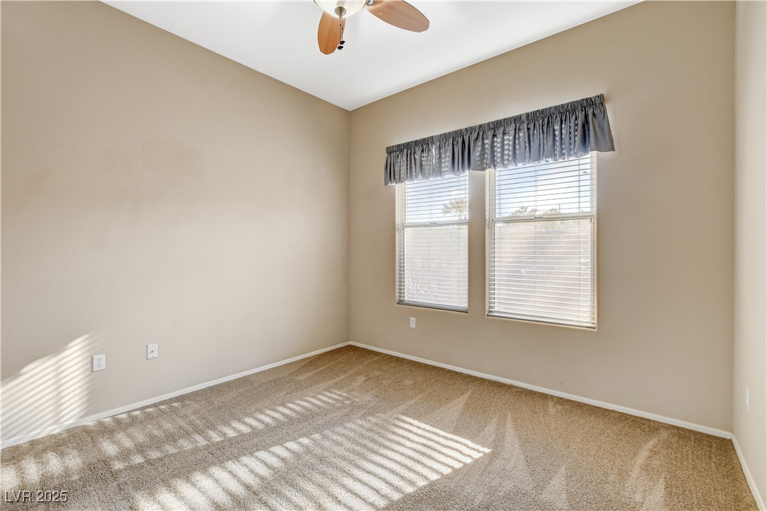 1904 Hot Oak Ridge Street Las Vegas, NV 89134 - Photo 30 of 74 Unfurnished room with carpet floors and a ceiling fan