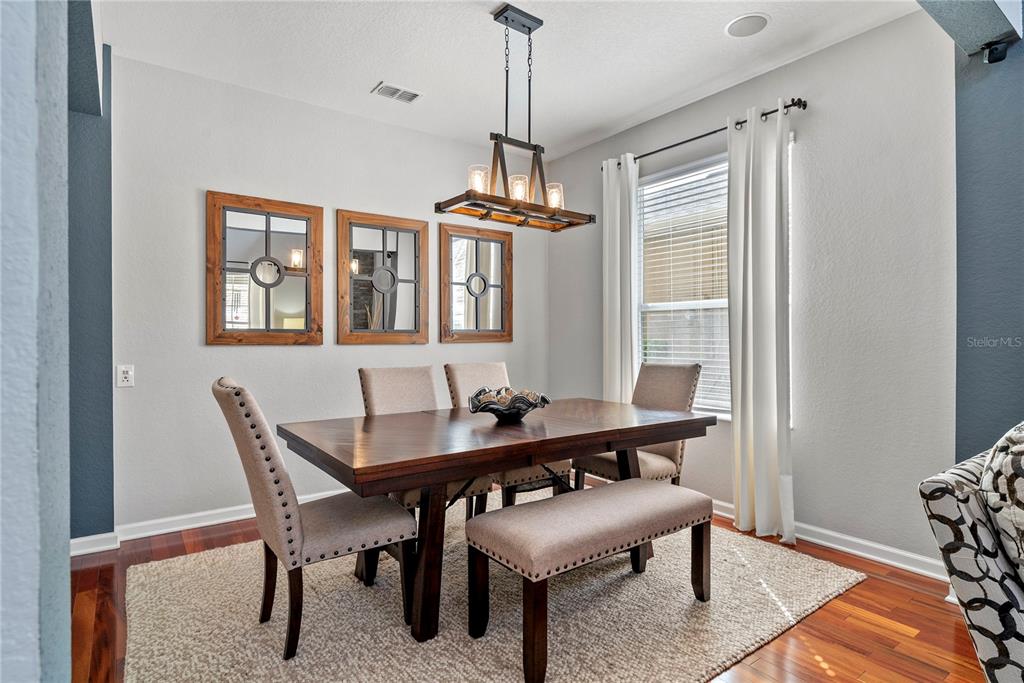 13320 Fernow Street Windermere, FL 34786 - Photo 11 of 52 a view of a dining room with furniture window and wooden floor