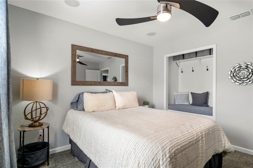 13320 Fernow Street Windermere, FL 34786 - Photo 38 of 52 a bedroom with a bed and a lamp