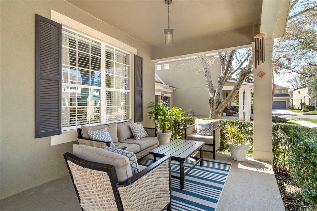 13320 Fernow Street Windermere, FL 34786 - Photo 4 of 52 a living room with furniture and a potted plant