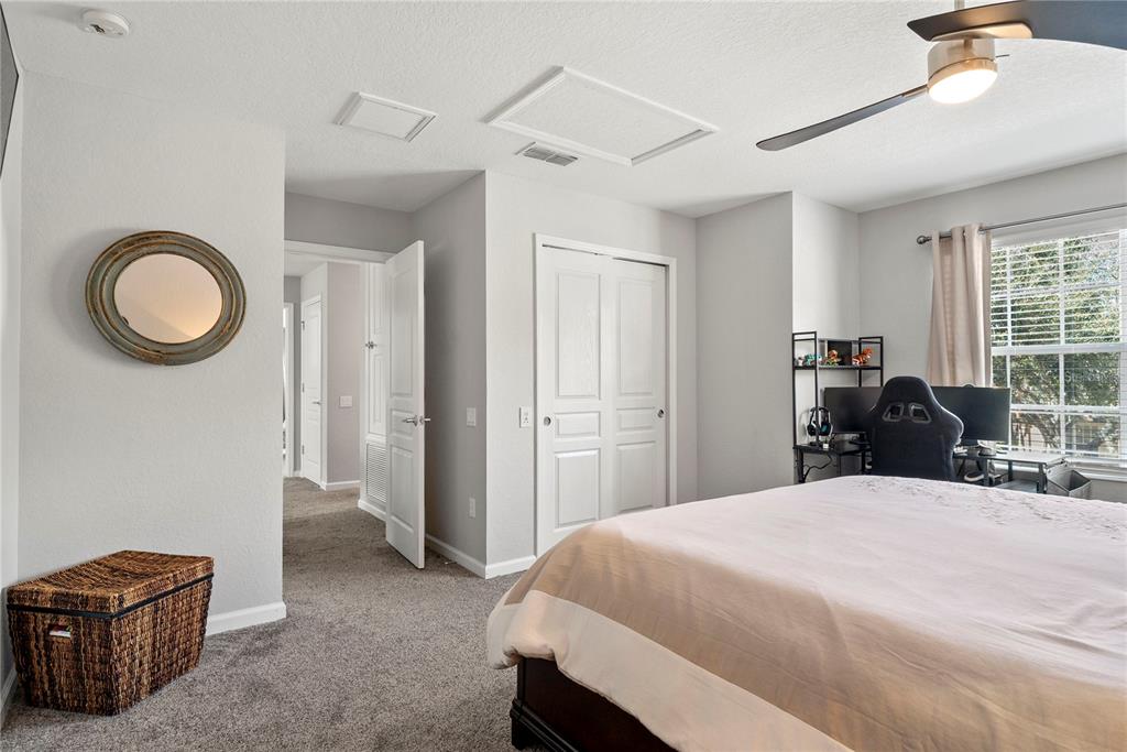 13320 Fernow Street Windermere, FL 34786 - Photo 42 of 52 a bedroom with a bed and a closet