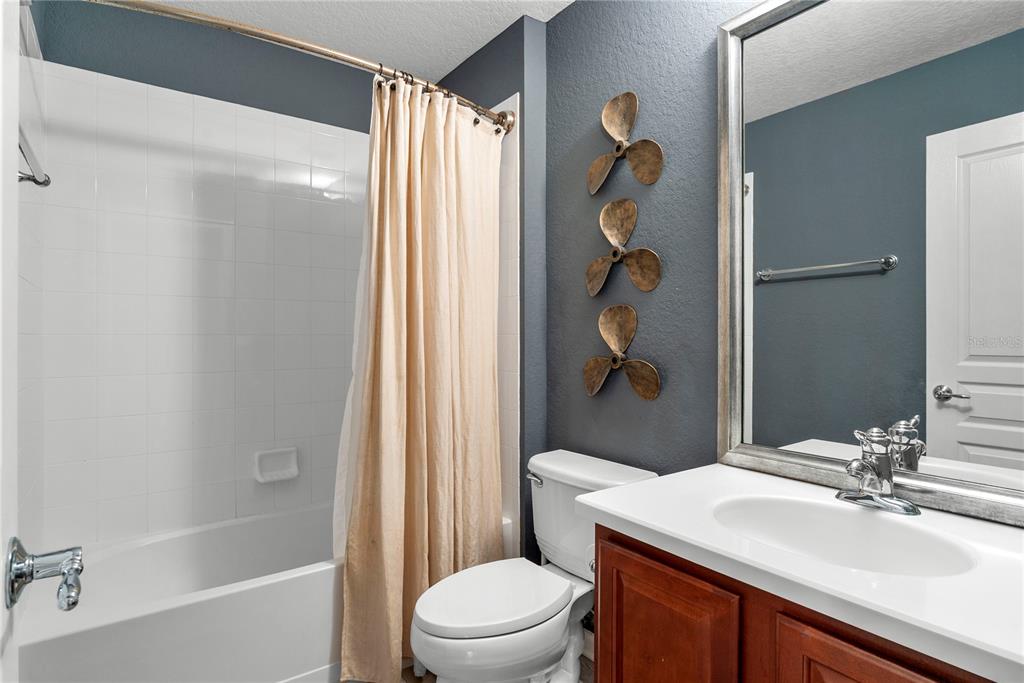 13320 Fernow Street Windermere, FL 34786 - Photo 43 of 52 a bathroom with a sink a toilet and shower