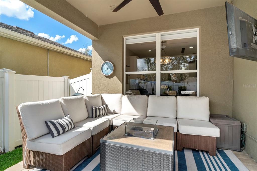 13320 Fernow Street Windermere, FL 34786 - Photo 47 of 52 a living room with furniture and a large window