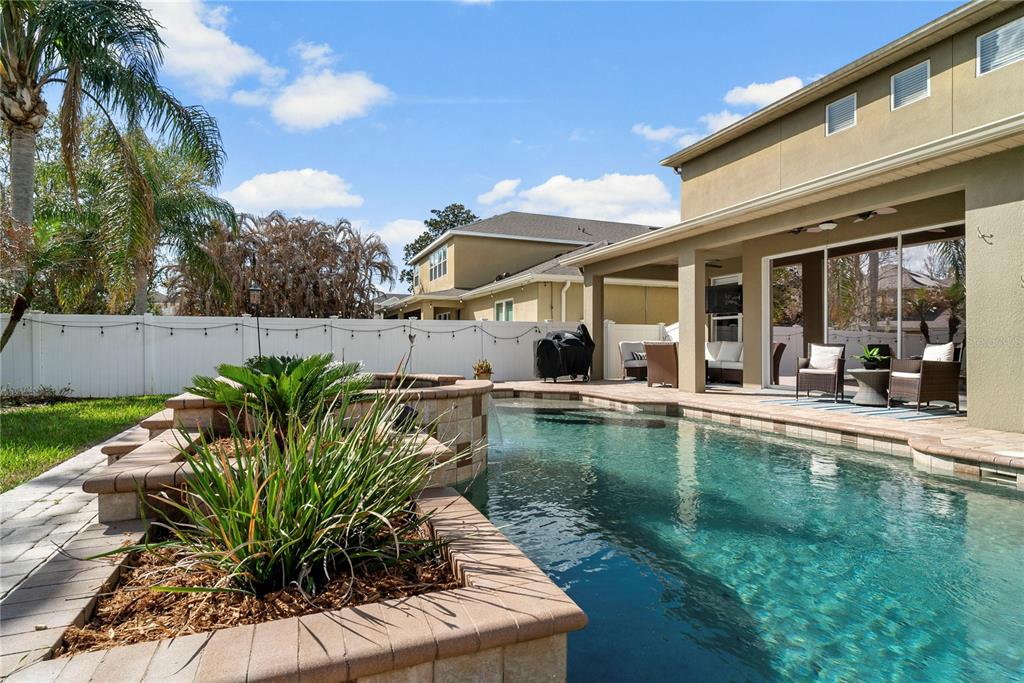 13320 Fernow Street Windermere, FL 34786 - Photo 50 of 52 a view of a house with pool and sitting area