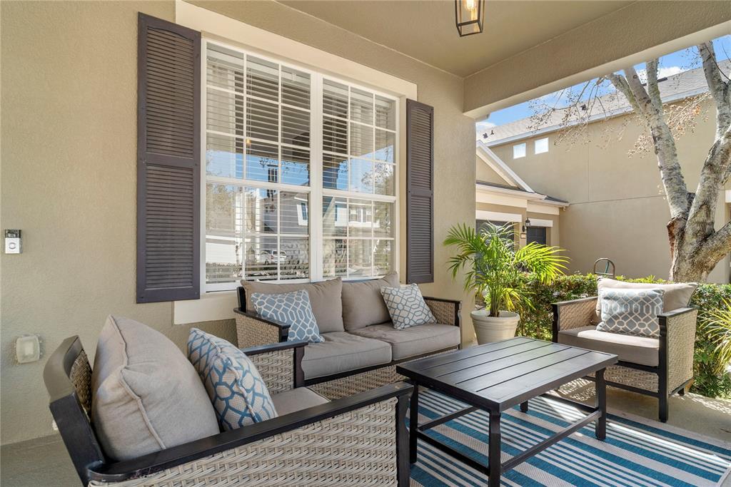 13320 Fernow Street Windermere, FL 34786 - Photo 5 of 52 a living room with furniture and a potted plant