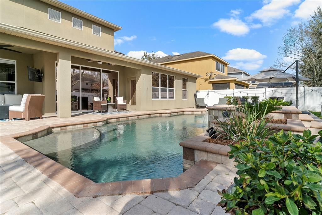 13320 Fernow Street Windermere, FL 34786 - Photo 52 of 52 a view of a house with pool and sitting area