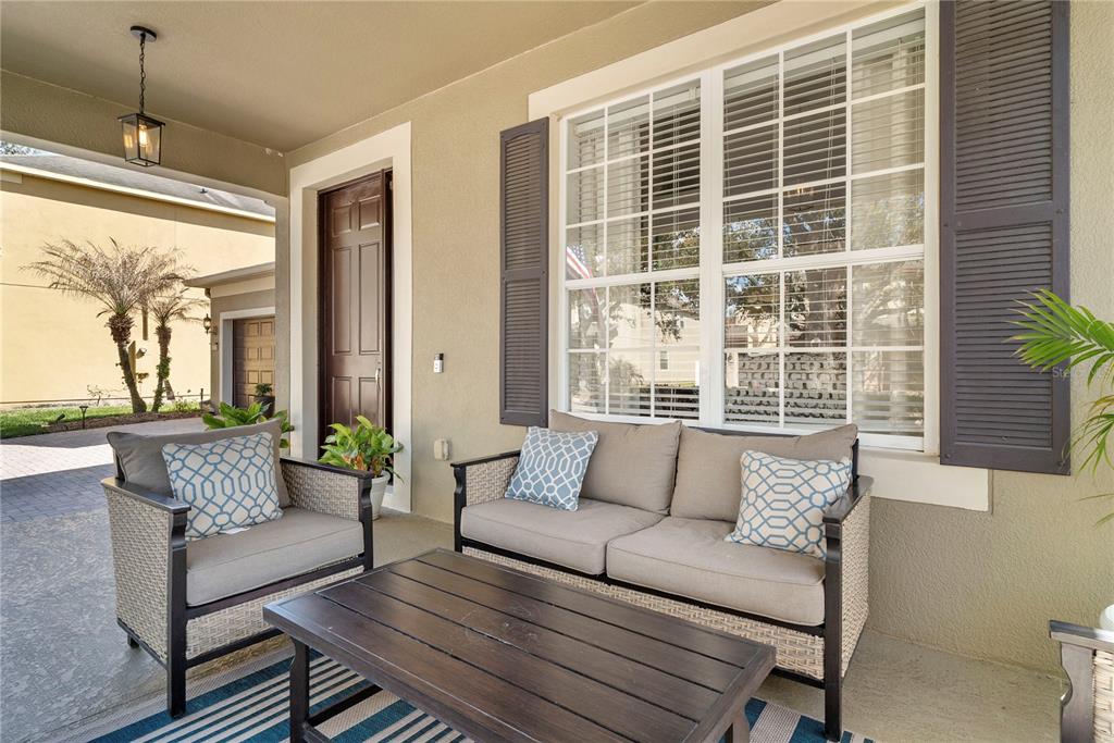 13320 Fernow Street Windermere, FL 34786 - Photo 6 of 52 a living room with furniture and a large window