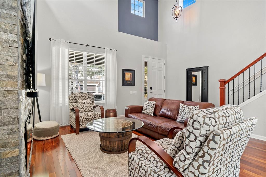 13320 Fernow Street Windermere, FL 34786 - Photo 9 of 52 a living room with furniture and a table