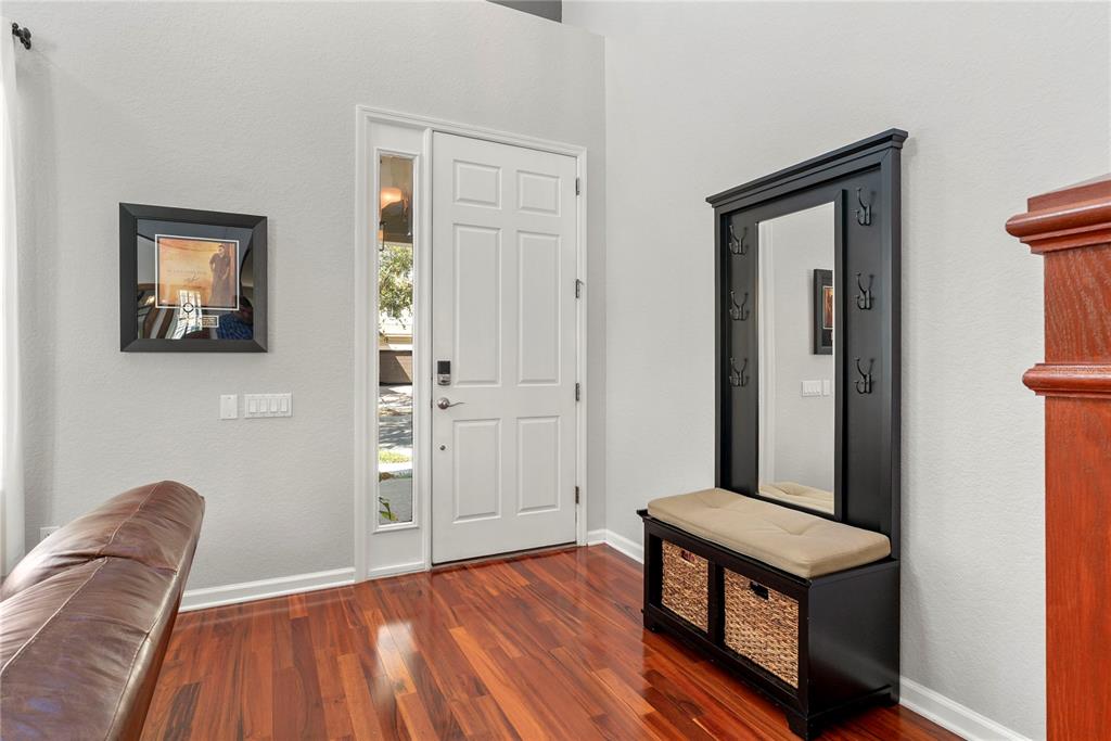 13320 Fernow Street Windermere, FL 34786 - Photo 10 of 52 a view of a livingroom with furniture and wooden floor