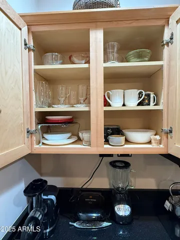 a room with a table and chairs