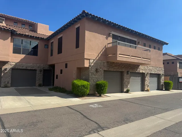 a view of a building with a street