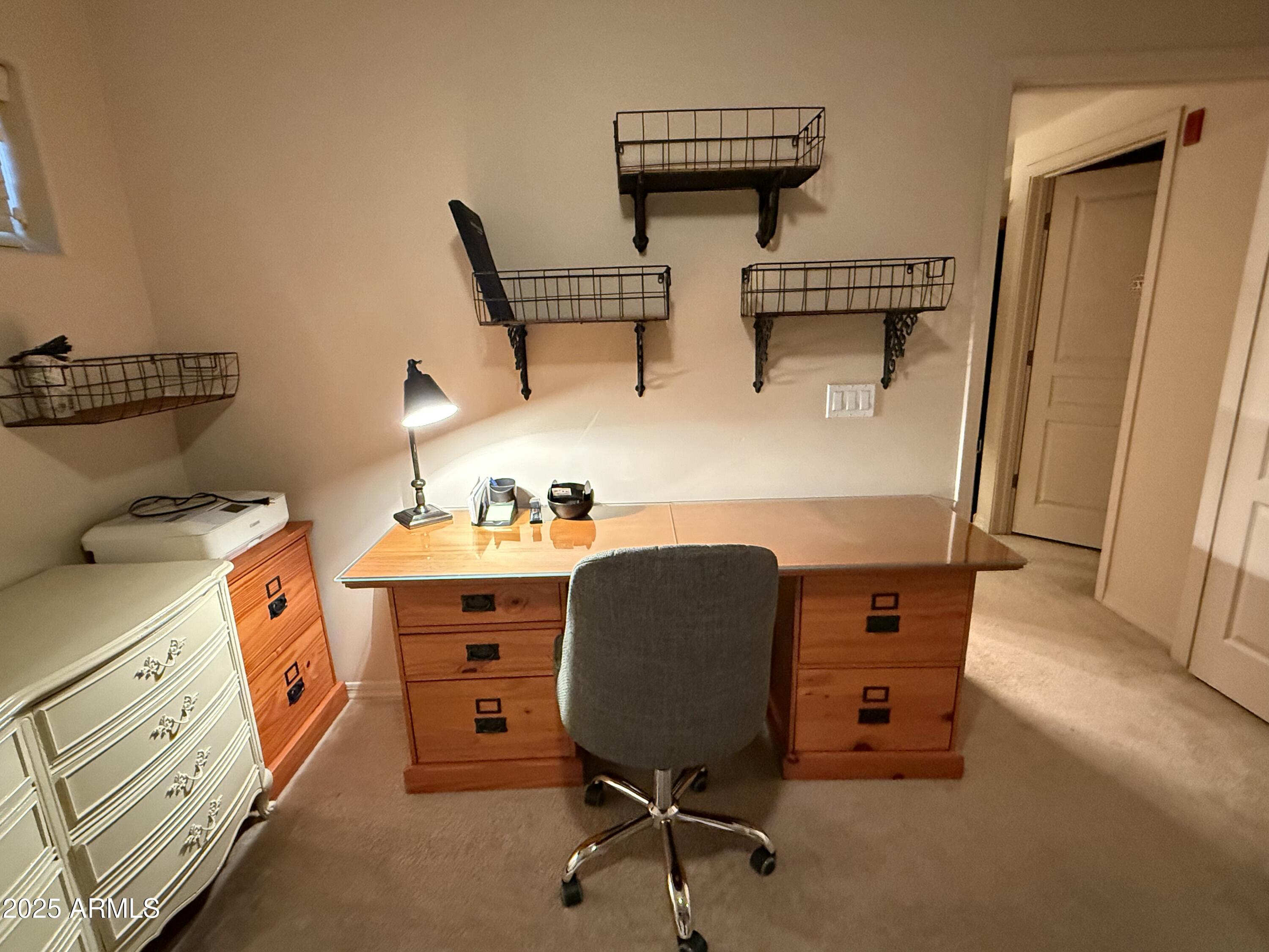 20660 North 40th Street, Unit 2137 Phoenix, AZ 85050 - Photo 10 of 22 a bed room with furniture and a mirror