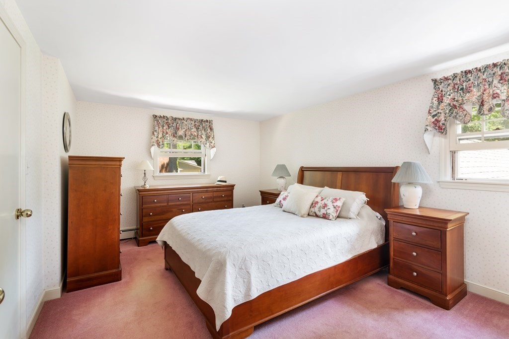 17 Winthrop Road Hingham, MA 02043 - Photo 14 of 27 a bedroom with a bed and a window