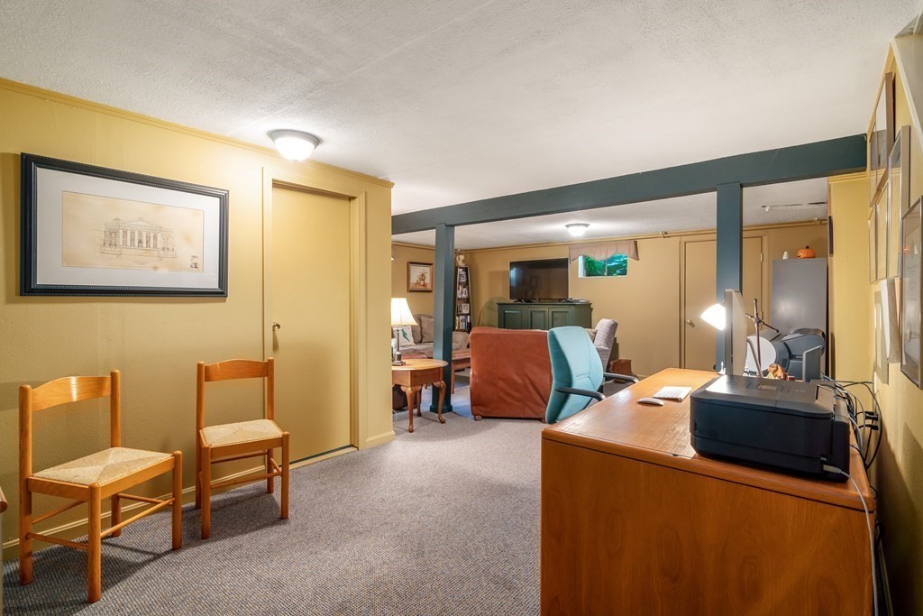 17 Winthrop Road Hingham, MA 02043 - Photo 19 of 27 a bedroom with furniture and a large window