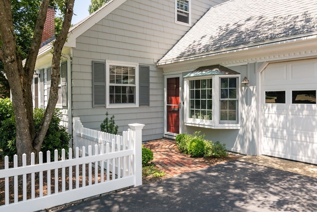 17 Winthrop Road Hingham, MA 02043 - Photo 3 of 27 a front view of a house with a yard
