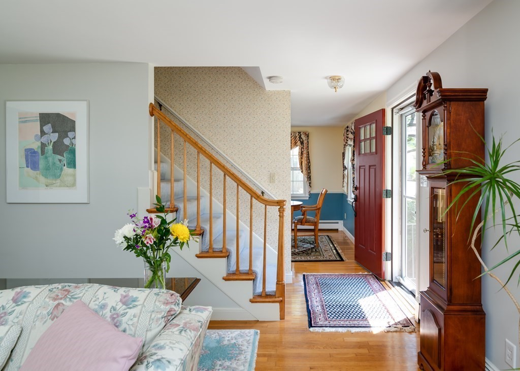 17 Winthrop Road Hingham, MA 02043 - Photo 10 of 27 a living room with furniture and a potted plant