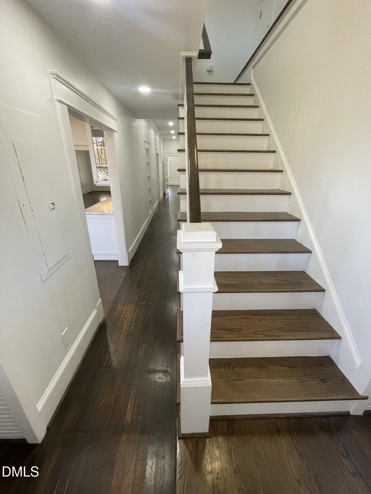 313 Calvin Road Raleigh, NC 27605 - Photo 23 of 39 a view of entryway and hall with wooden floor
