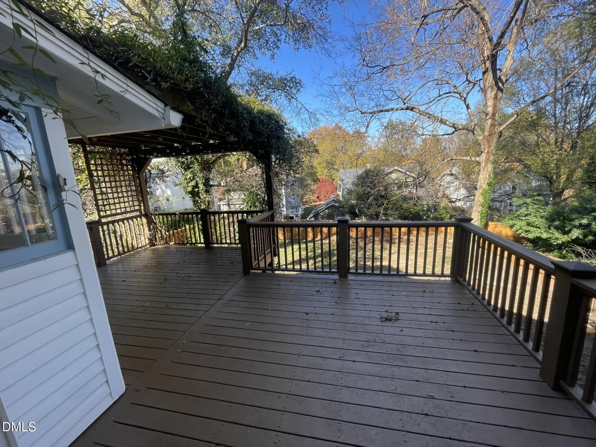 313 Calvin Road Raleigh, NC 27605 - Photo 24 of 39 a view of balcony with wooden floor and seating space