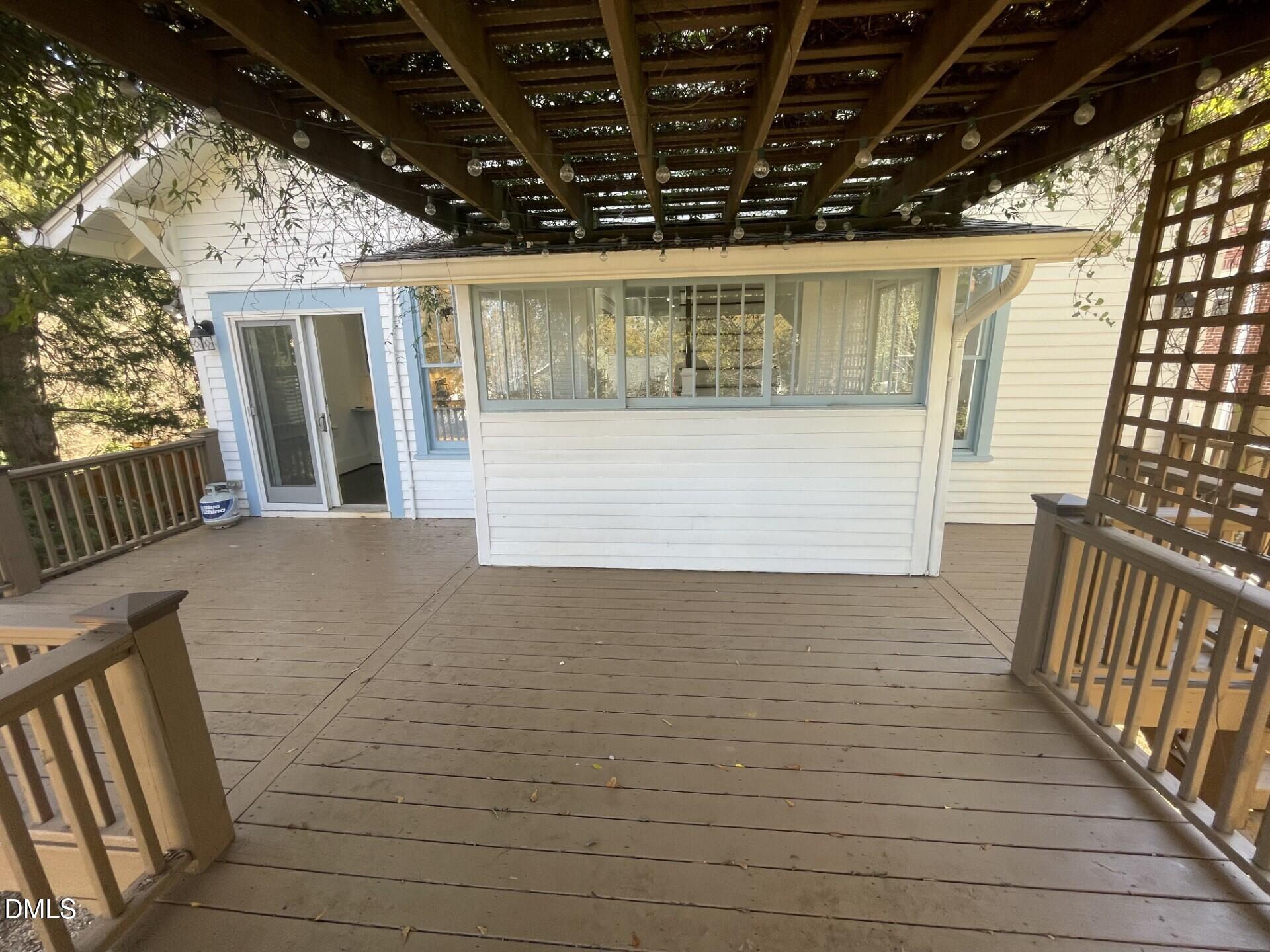 313 Calvin Road Raleigh, NC 27605 - Photo 27 of 39 a view of porch with wooden floor